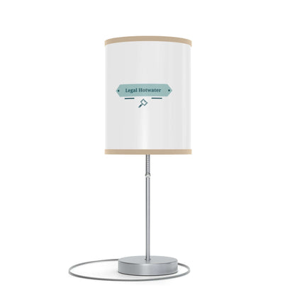 Stylish table lamp on steel stand with customizable shade, suitable for US and CA power outlets.